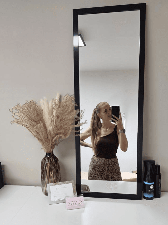 The Zazie Beauty treatment room with mirror and pampas grass